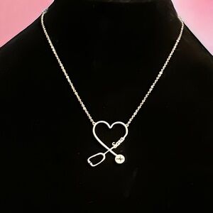 Silver tone name Sara stethoscope heart necklace